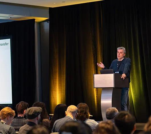 Jose Penades speaking at the 2026 Unorthodox Genomes Symposium