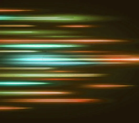Speed light streaks in green, orange and blue