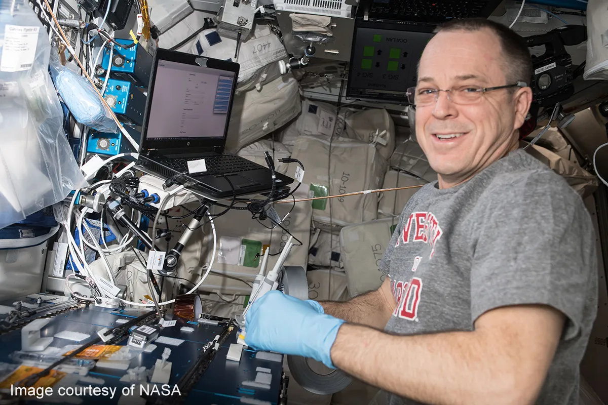 Smiling scientist in International Space Station – ISS