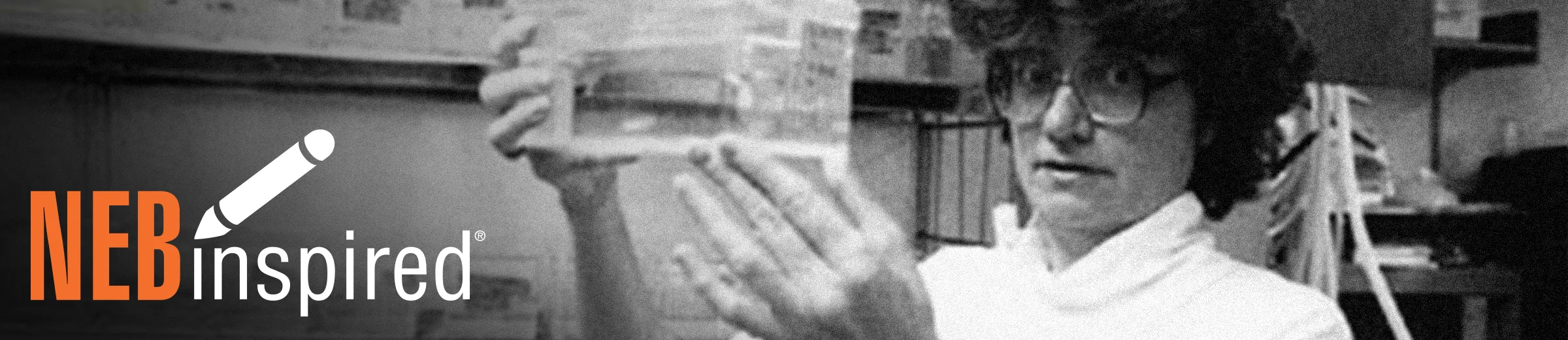 Photo of Nancy Hopkins at MIT lab with NEBinspired logo