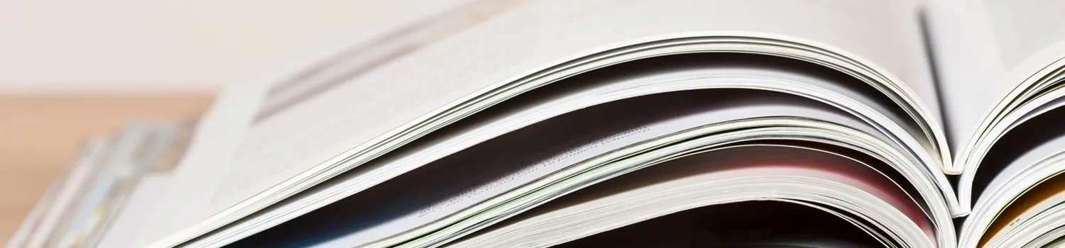 Stack of publications on desk