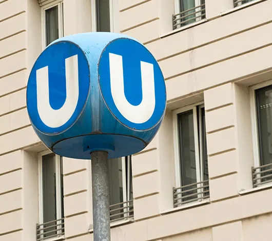 U-Bahn "U" sign in Vienna, with NEBinspired logo