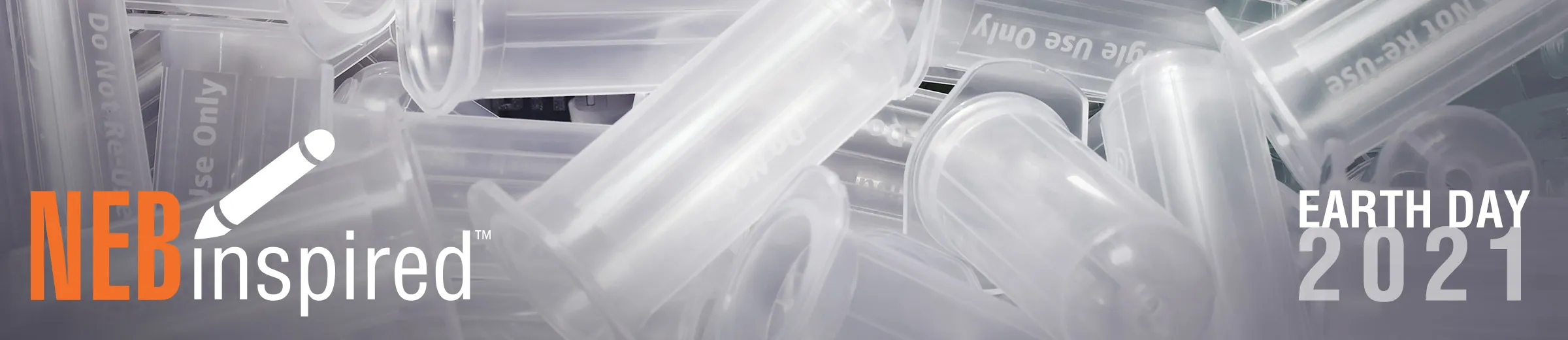 Pile of microcentrifuge tubes, with NEBinspired logo
