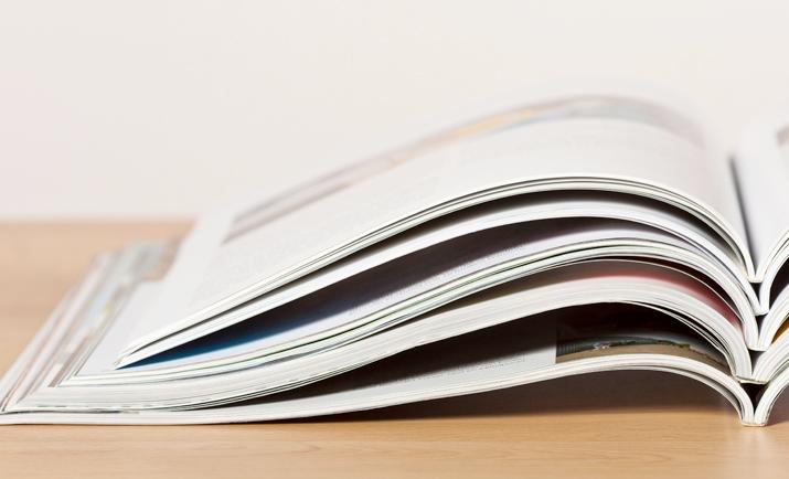 Stack of publications on desk