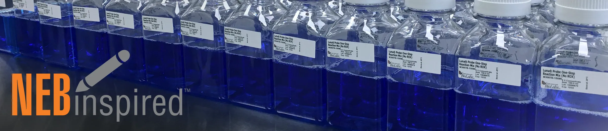 Row of blue reagents in glass bottles, with NEBinspired logo